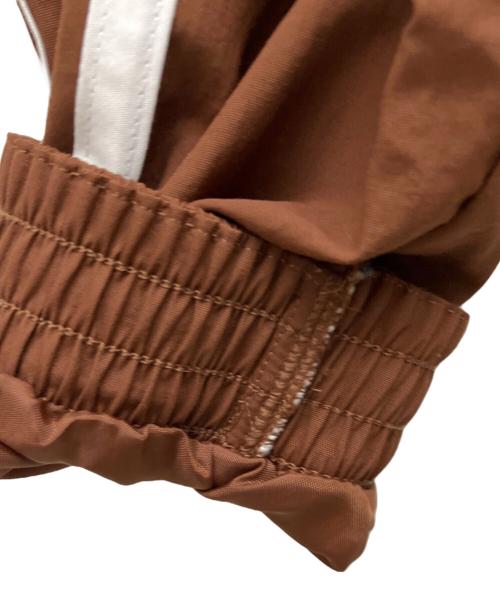 adidas（アディダス）adidas (アディダス) ウーブン ファイヤーバード トラックトラップ ブラウン サイズ:Ｓの古着・服飾アイテム