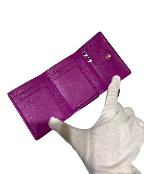 ANYA HINDMARCH（アニヤ・ハインドマーチ）ANYA HINDMARCH (アニヤ・ハインドマーチ) 3つ折り財布 ボルドーの古着・服飾アイテム