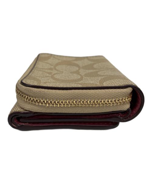 COACH（コーチ）COACH (コーチ) 3つ折り財布 ベージュの古着・服飾アイテム