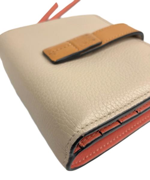 LOEWE（ロエベ）LOEWE (ロエベ) コンパクト ジップウォレット ベージュ×オレンジの古着・服飾アイテム