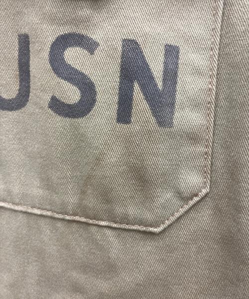 TOYS MCCOY（トイズマッコイ）TOYS McCOY (トイズマッコイ) TM&WarnerBros (ワーナー・ブラザース) ミリタリージャケット ロードランナー カーキ サイズ:Sの古着・服飾アイテム