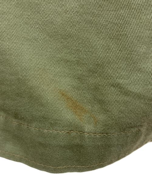 TOYS MCCOY（トイズマッコイ）TOYS McCOY (トイズマッコイ) TM&WarnerBros (ワーナー・ブラザース) ミリタリージャケット ロードランナー カーキ サイズ:Sの古着・服飾アイテム