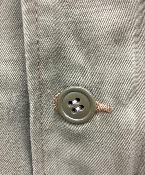 TOYS MCCOY（トイズマッコイ）TOYS McCOY (トイズマッコイ) TM&WarnerBros (ワーナー・ブラザース) ミリタリージャケット ロードランナー カーキ サイズ:Sの古着・服飾アイテム