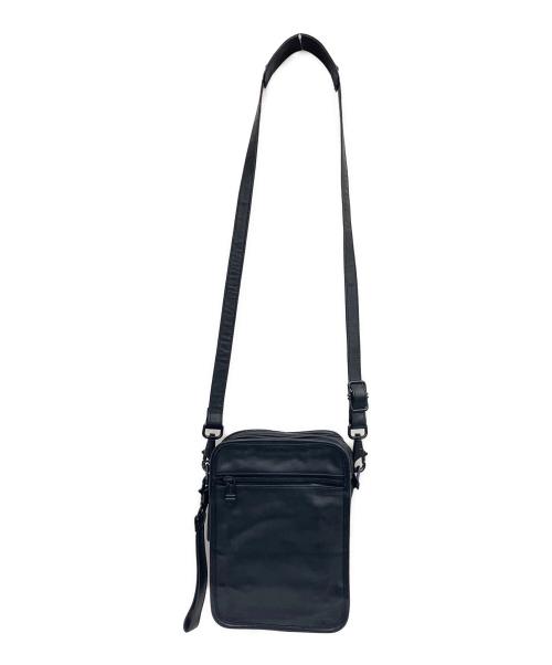 TUMI（トゥミ）TUMI (トゥミ) レザーショルダーバッグ ブラックの古着・服飾アイテム