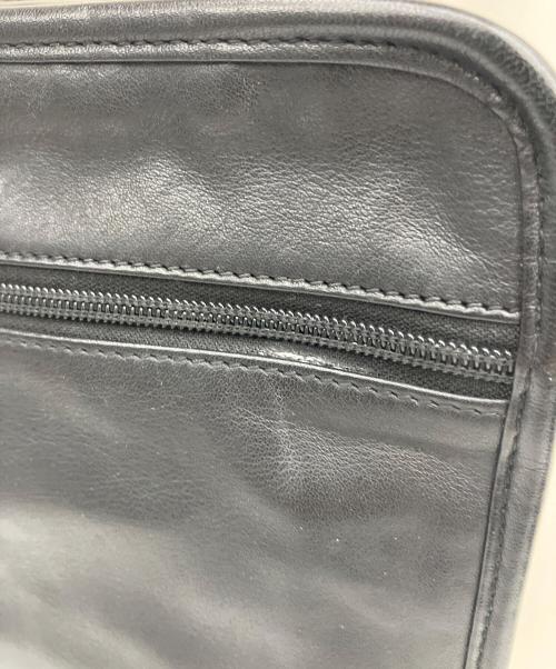 TUMI（トゥミ）TUMI (トゥミ) レザーショルダーバッグ ブラックの古着・服飾アイテム