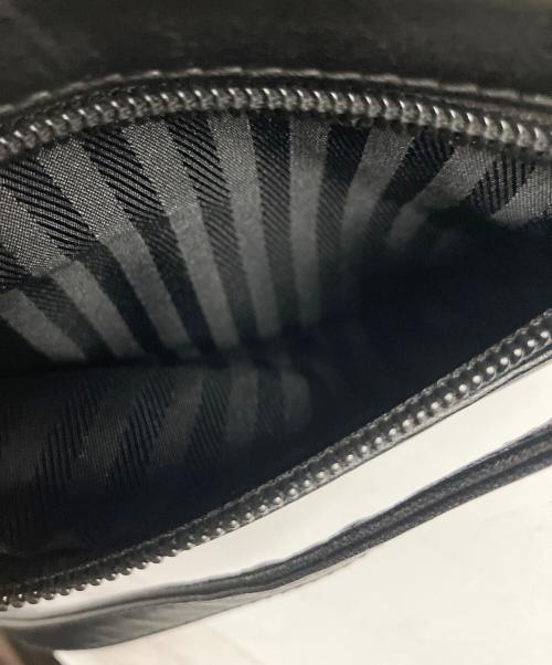 TUMI（トゥミ）TUMI (トゥミ) レザーショルダーバッグ ブラックの古着・服飾アイテム