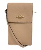 COACHコーチ）の古着「スマホショルダー」｜ベージュ
