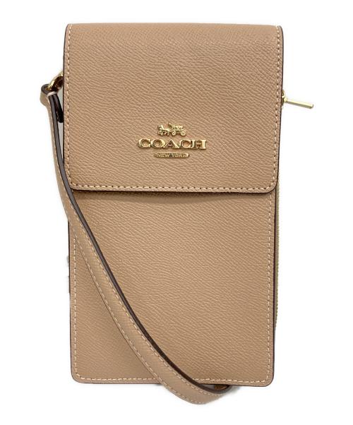 COACH（コーチ）COACH (コーチ) スマホショルダー ベージュの古着・服飾アイテム
