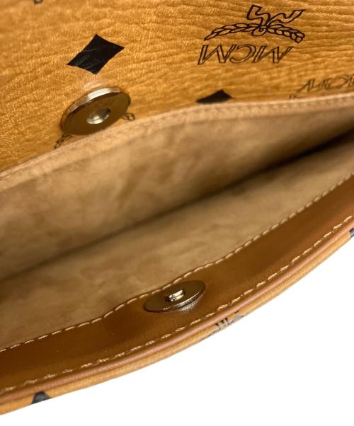 MCM（エムシーエム）MCM (エムシーエム) クラッチバッグ ブラウンの古着・服飾アイテム
