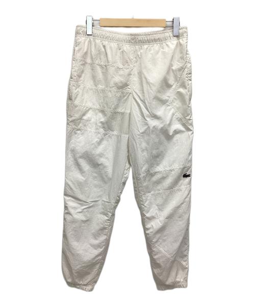 LACOSTE（ラコステ）LACOSTE (ラコステ) アシンメトリーパッチワークトラックパンツ ホワイト サイズ:US Mの古着・服飾アイテム