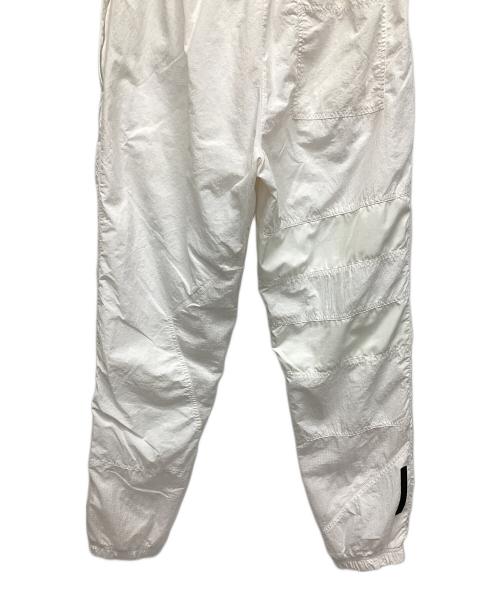 LACOSTE（ラコステ）LACOSTE (ラコステ) アシンメトリーパッチワークトラックパンツ ホワイト サイズ:US Mの古着・服飾アイテム