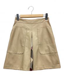 BLUE LABEL CRESTBRIDGE（ブルーレーベルクレストブリッジ）の古着「フェイクレザースカート」｜ベージュ