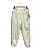 adidasアディダス）の古着「トラックパンツ」｜クリーム