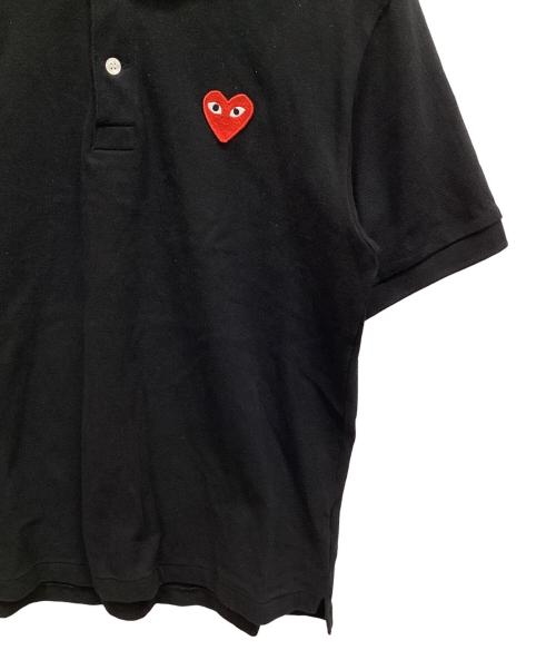 PLAY COMME des GARCONS（プレイコムデギャルソン）PLAY COMME des GARCONS (プレイコムデギャルソン) ポロシャツ ブラック サイズ:Mの古着・服飾アイテム