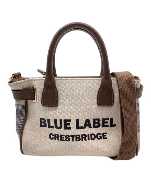 BLUE LABEL CRESTBRIDGE（ブルーレーベルクレストブリッジ）BLUE LABEL CRESTBRIDGE (ブルーレーベルクレストブリッジ) ロゴプリントハトメトート アイボリーの古着・服飾アイテム