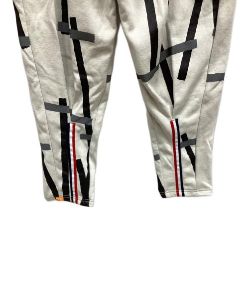 le coq sportif（ルコックスポルティフ）le coq sportif (ルコックスポルティフ) イージーパンツ ホワイト×ブラック サイズ:Mの古着・服飾アイテム