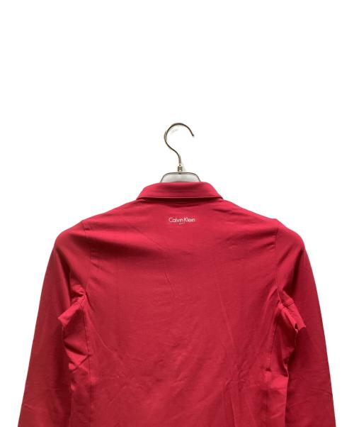 Calvin Klein（カルバンクライン）Calvin Klein (カルバンクライン) 長袖ポロシャツ ショッキングピンク サイズ:M 未使用品の古着・服飾アイテム