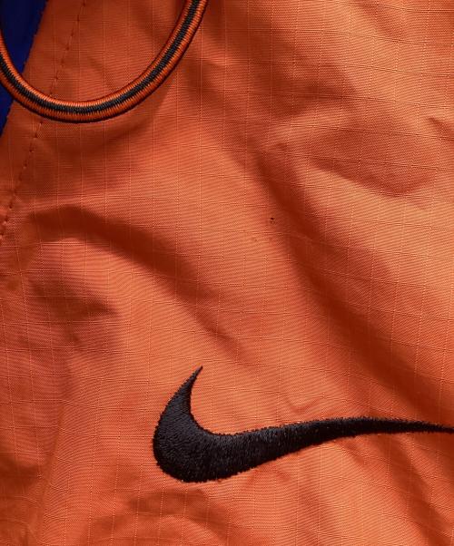 NIKE ACG（ナイキエーシージー）NIKE ACG (ナイキエーシージー) ジャケット オレンジ×ブルー サイズ:Mの古着・服飾アイテム