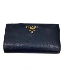 PRADA（プラダ）の古着「2つ折り財布」｜ブラック×レッド
