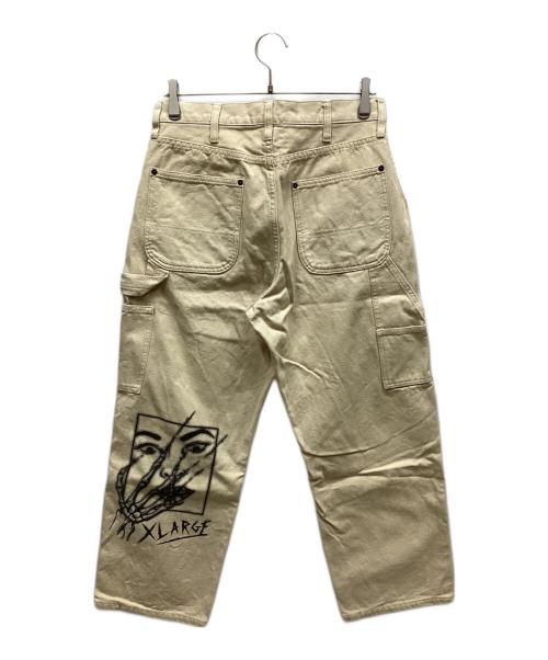 X-LARGE（エクストララージ）X-LARGE (エクストララージ) グラフィックペインターパンツ ベージュ サイズ:32の古着・服飾アイテム