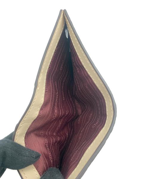 Kate Spade（ケイトスペード）Kate Spade (ケイトスペード) アヴァ カラーブロックド ジップ バイフォールド ウォレット バーガンディーの古着・服飾アイテム