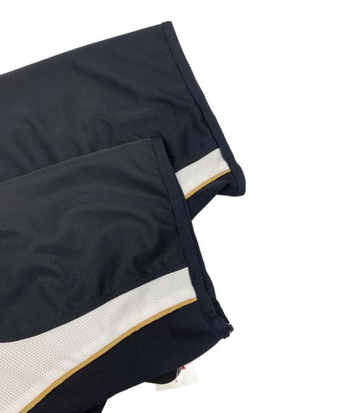 UMBRO（アンブロ）UMBRO (アンブロ) マンチェスターユナイテッド 100周年記念ユニフォーム ブラック×ホワイト サイズ:XXLの古着・服飾アイテム