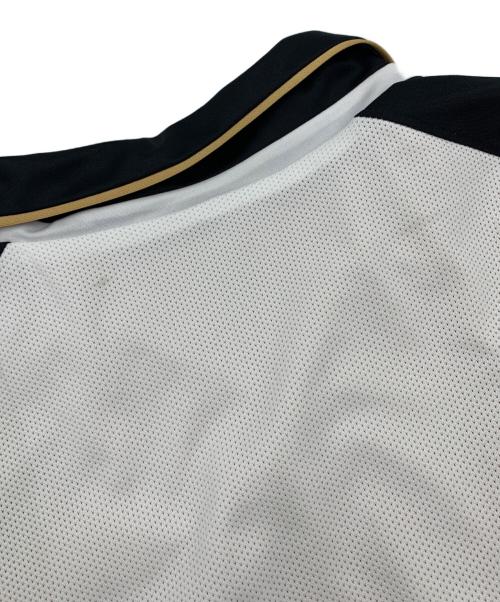 UMBRO（アンブロ）UMBRO (アンブロ) マンチェスターユナイテッド 100周年記念ユニフォーム ブラック×ホワイト サイズ:XXLの古着・服飾アイテム