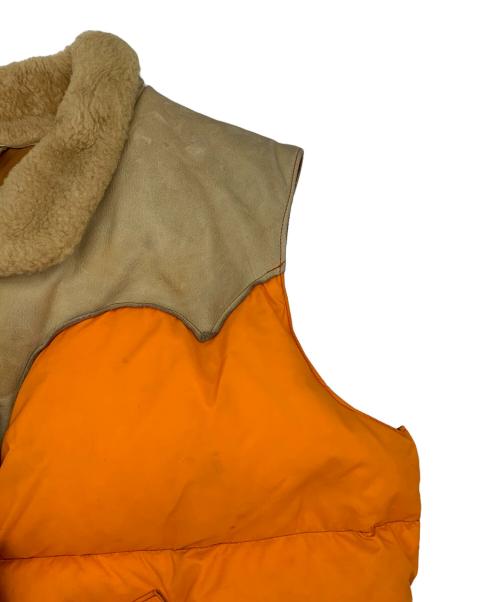 Rocky Mountain FeatherBed（ロッキーマウンテンフェザーベッド）Rocky Mountain FeatherBed (ロッキーマウンテンフェザーベッド) ダウンベスト ベージュ×オレンジ サイズ:11/12の古着・服飾アイテム