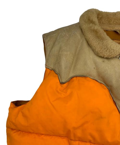 Rocky Mountain FeatherBed（ロッキーマウンテンフェザーベッド）Rocky Mountain FeatherBed (ロッキーマウンテンフェザーベッド) ダウンベスト ベージュ×オレンジ サイズ:11/12の古着・服飾アイテム