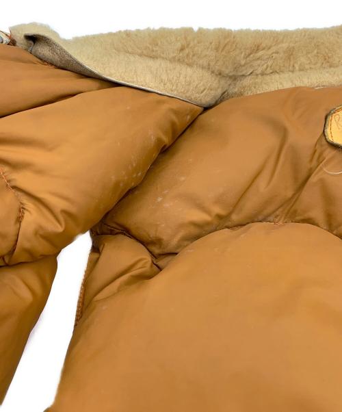 Rocky Mountain FeatherBed（ロッキーマウンテンフェザーベッド）Rocky Mountain FeatherBed (ロッキーマウンテンフェザーベッド) ダウンベスト ベージュ×オレンジ サイズ:11/12の古着・服飾アイテム