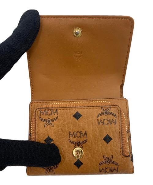 MCM（エムシーエム）MCM (エムシーエム) 3つ折り財布 ブラウンの古着・服飾アイテム