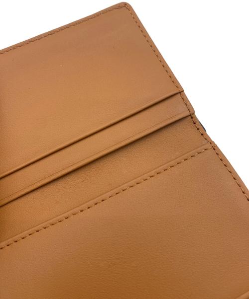 MCM（エムシーエム）MCM (エムシーエム) 3つ折り財布 ブラウンの古着・服飾アイテム