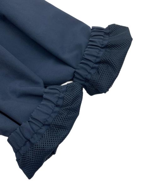 UNIQLO（ユニクロ）UNIQLO (ユニクロ) KAWS (カウズ) コーチジャケット ネイビー サイズ:XXLの古着・服飾アイテム