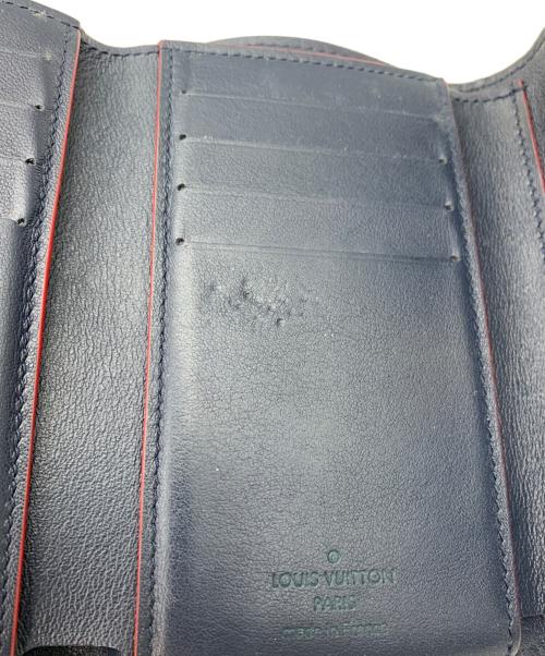 LOUIS VUITTON（ルイ ヴィトン）LOUIS VUITTON (ルイ ヴィトン) ポルトフォイユ･カプシーヌ コンパクト ネイビー×レッドの古着・服飾アイテム