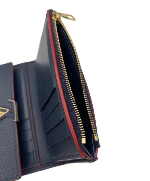LOUIS VUITTON（ルイ ヴィトン）LOUIS VUITTON (ルイ ヴィトン) ポルトフォイユ･カプシーヌ コンパクト ネイビー×レッドの古着・服飾アイテム