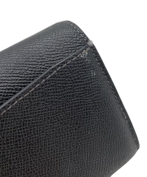 COACH（コーチ）COACH (コーチ) フラップウォレット ブラックの古着・服飾アイテム