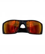 OAKLEYオークリー）の古着「サングラス」｜ブラック×オレンジ