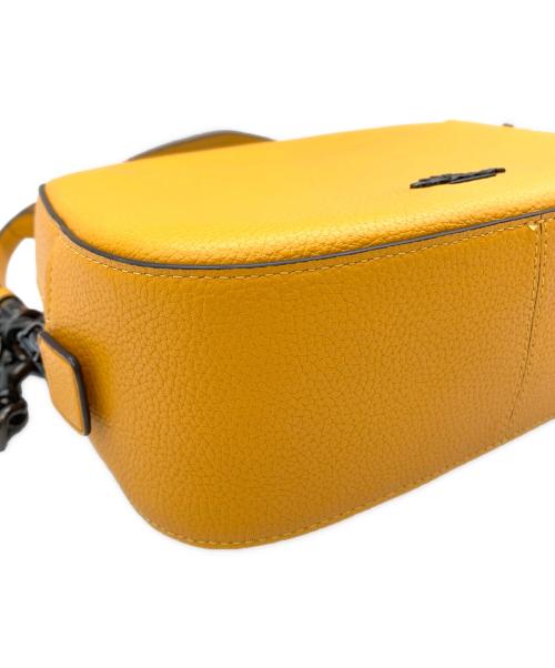 COACH（コーチ）COACH (コーチ) カメラバッグ オレンジの古着・服飾アイテム