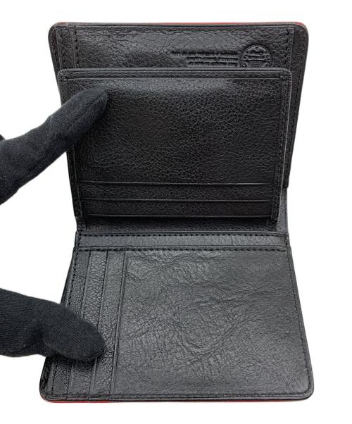 DAKOTA（ダコタ）DAKOTA (ダコタ)  BLACK LABEL キャーロ/2つ折り財布 レッドの古着・服飾アイテム