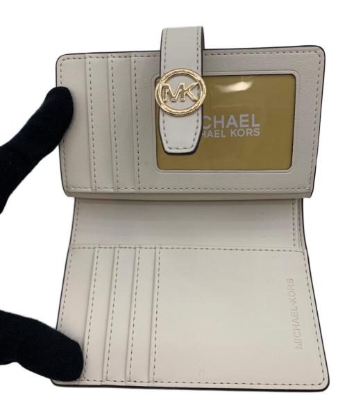 MICHAEL KORS（マイケルコース）MICHAEL KORS (マイケルコース) GREENWICH タブ ジップラウンド ウォレット ミディアム ベージュの古着・服飾アイテム