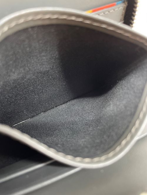 PAUL SMITH（ポールスミス）PAUL SMITH (ポールスミス) ブライトストライププラー財布 ブラックの古着・服飾アイテム