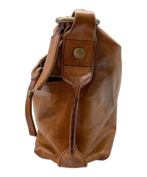 CORNELIAN TAURUS by daisuke iwanaga（コーネリアンタウラス バイ ダイスケイワナガ）CORNELIAN TAURUS by daisuke iwanaga (コーネリアンタウラス バイ ダイスケイワナガ) レザーショルダーバッグ ブラウンの古着・服飾アイテム