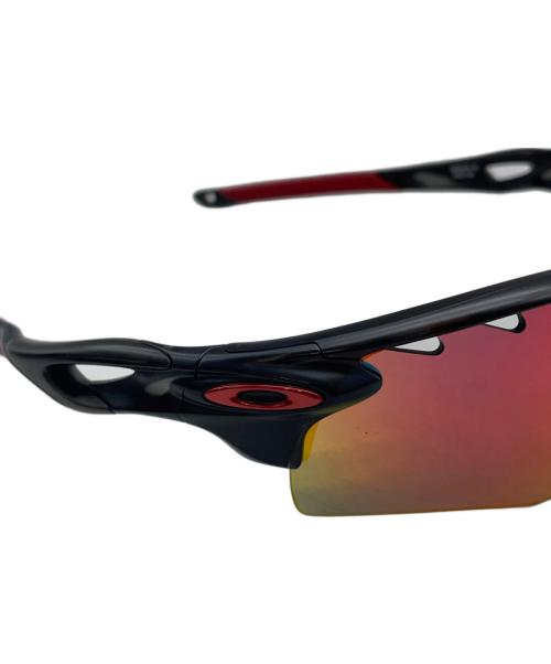 OAKLEY（オークリー）OAKLEY (オークリー) サングラス ブラック×レッドの古着・服飾アイテム