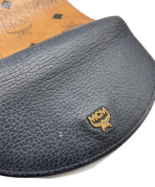 MCM（エムシーエム）MCM (エムシーエム) 3つ折り財布 ブラウン×ブラックの古着・服飾アイテム