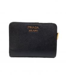 PRADA（プラダ）の古着「2つ折り財布」｜ブラック