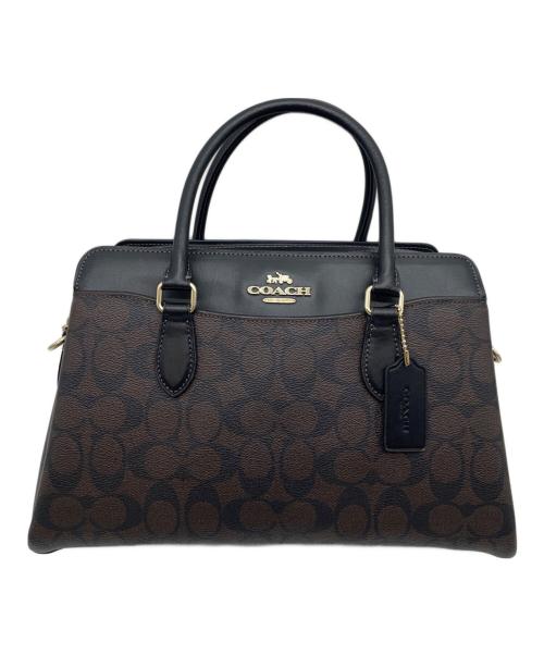 COACH（コーチ）COACH (コーチ) ダーシー キャリーオール・シグネチャー2WAYバッグ ブラウンの古着・服飾アイテム