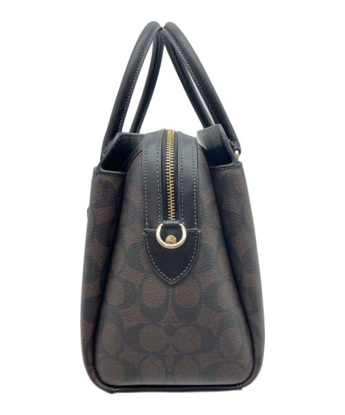 COACH（コーチ）COACH (コーチ) ダーシー キャリーオール・シグネチャー2WAYバッグ ブラウンの古着・服飾アイテム