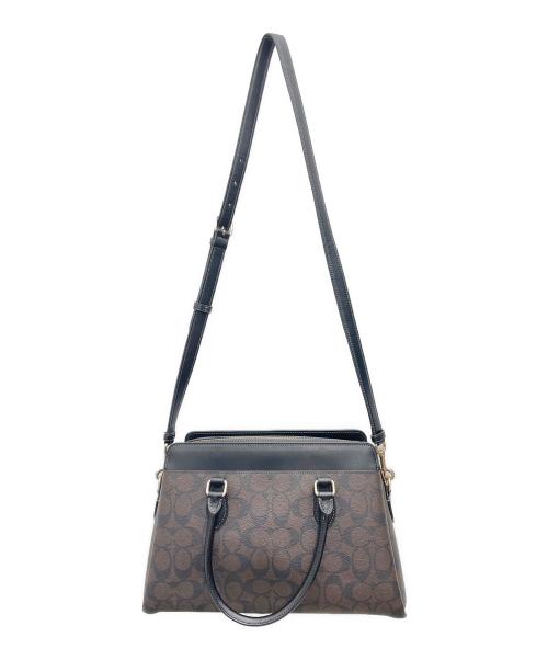 COACH（コーチ）COACH (コーチ) ダーシー キャリーオール・シグネチャー2WAYバッグ ブラウンの古着・服飾アイテム