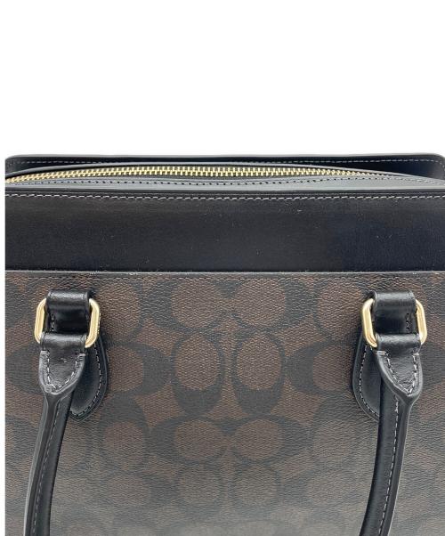 COACH（コーチ）COACH (コーチ) ダーシー キャリーオール・シグネチャー2WAYバッグ ブラウンの古着・服飾アイテム