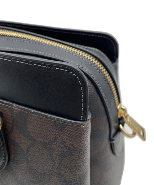 COACH（コーチ）COACH (コーチ) ダーシー キャリーオール・シグネチャー2WAYバッグ ブラウンの古着・服飾アイテム
